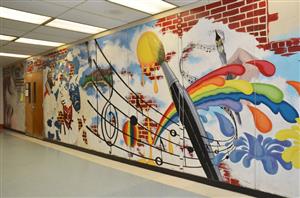 Paintbrush mural - rainbow, music notes, theater masks and bricks 