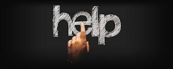 Hand pointing to the word help 