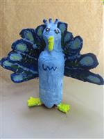 Blue peacock sculpture made of recycled bottle