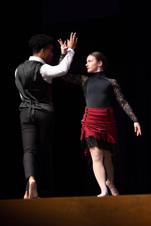 2 dancers from Broadneck HS performing a duet in a jazz piece at the 2020 Dance Festivals - High School Gala