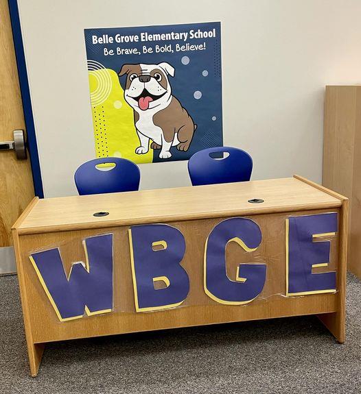 Picture of morning announcement desk and banner